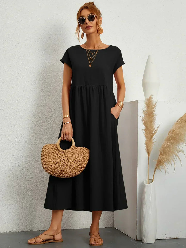 Lora | A midi dress with timeless elegance